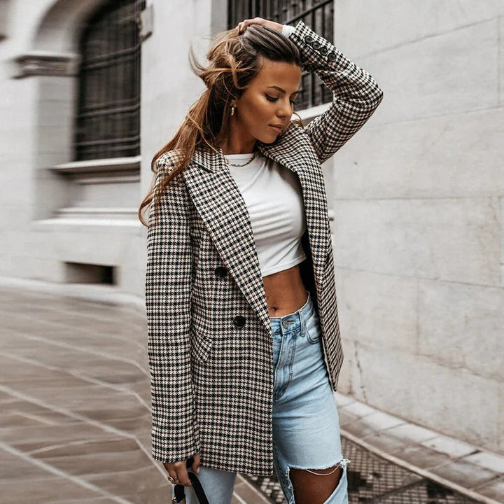 Elegant women's checked blazer in a classic pattern, offering effortless style for spring, autumn & office wear.