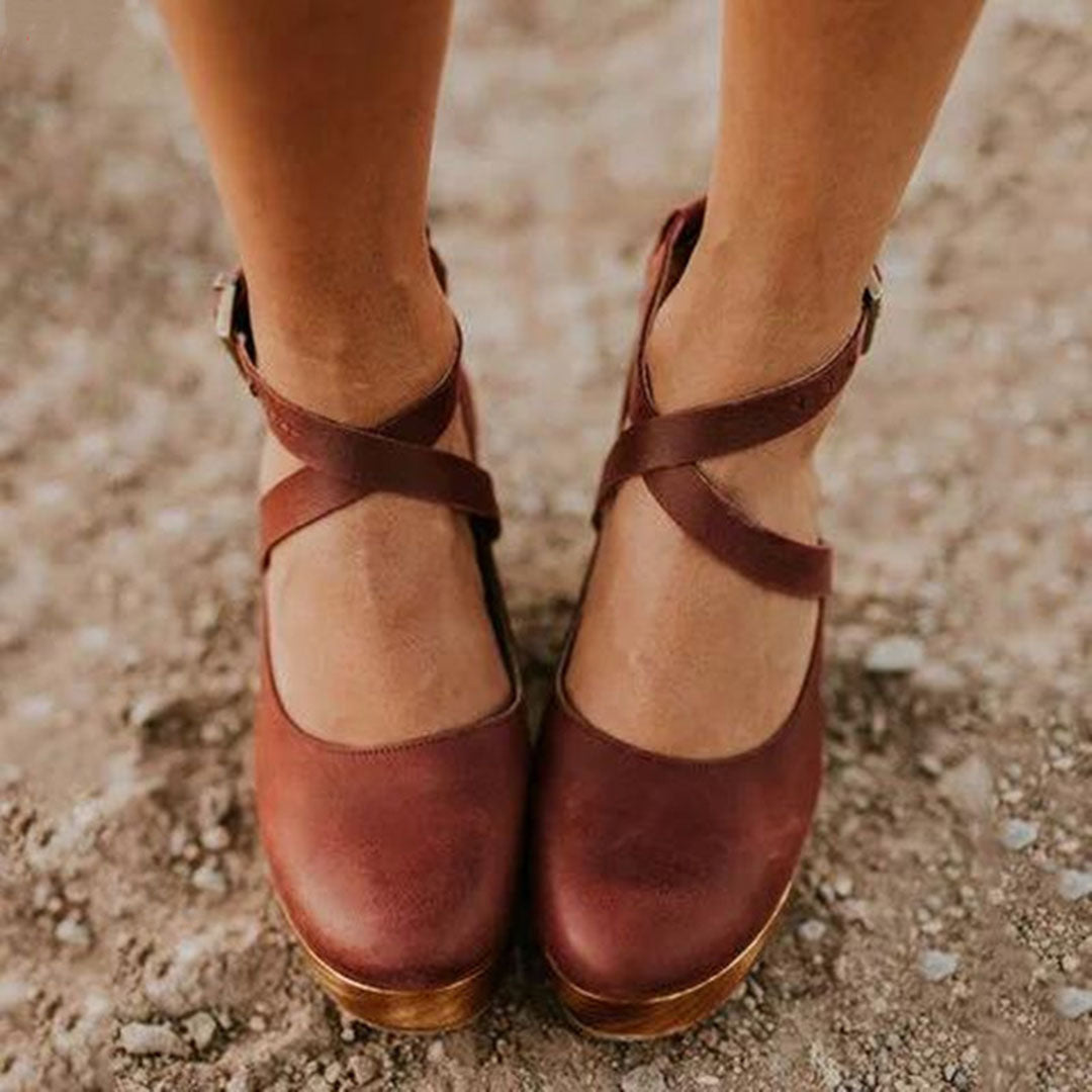 Versatile women's closed-toe wedge heels with comfortable ankle strap; a chic sandal for all occasions.