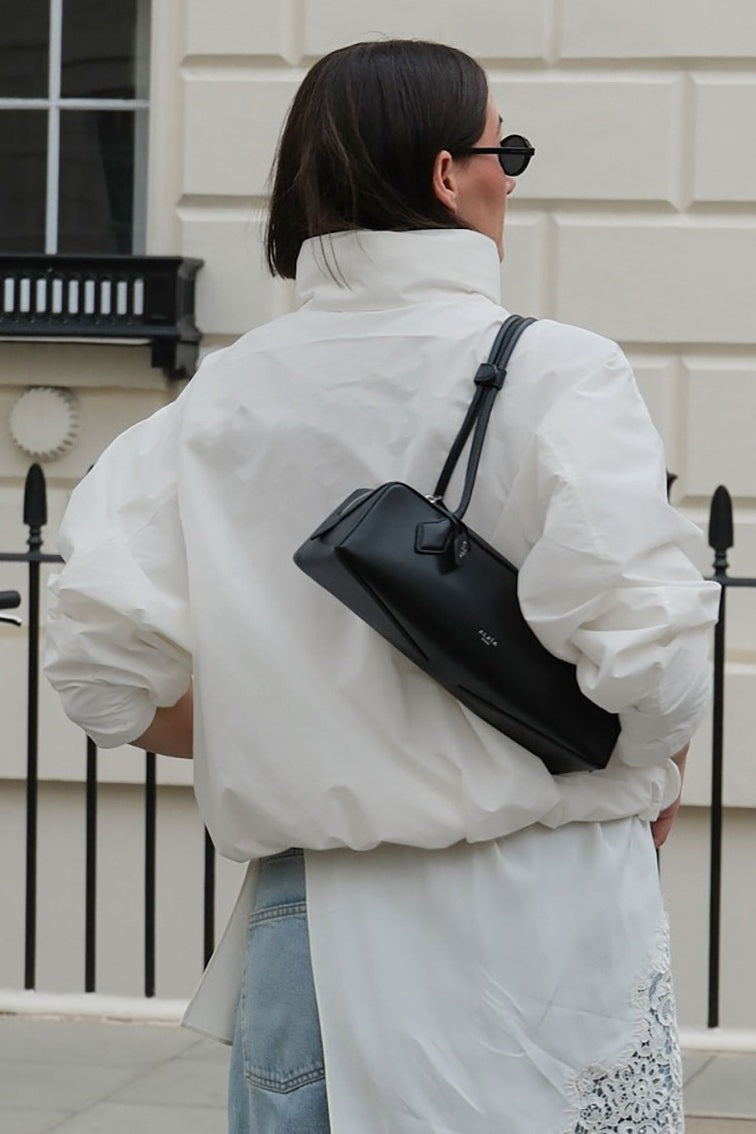 Back view of the versatile women's collar windbreaker jacket, perfect for all weather