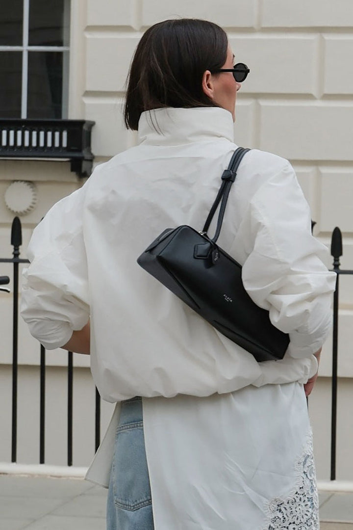 Back view of the versatile women's collar windbreaker jacket, perfect for all weather