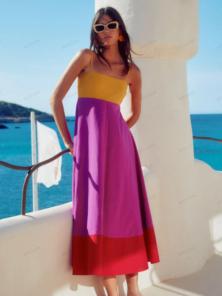 Elegant women's color block spaghetti strap midi dress, versatile for beachwear, parties, or everyday summer fashion.