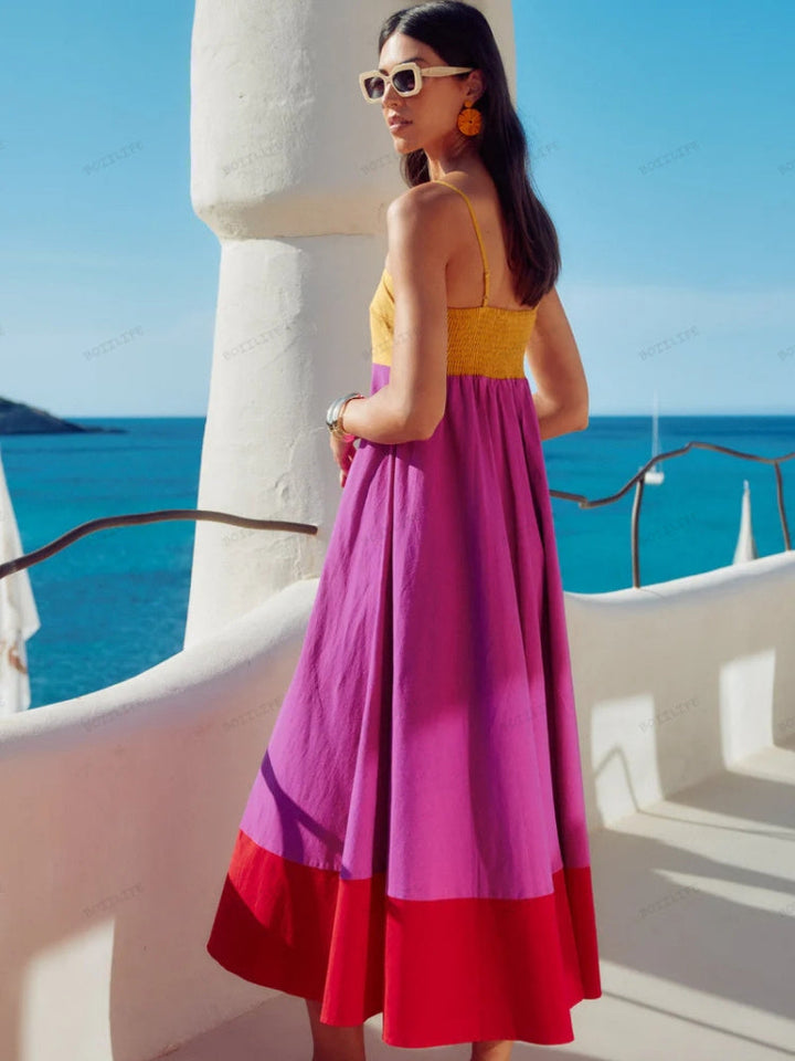 Stylish women's sleeveless color block midi dress with spaghetti straps, ideal for summer, casual outings, or elegant parties.