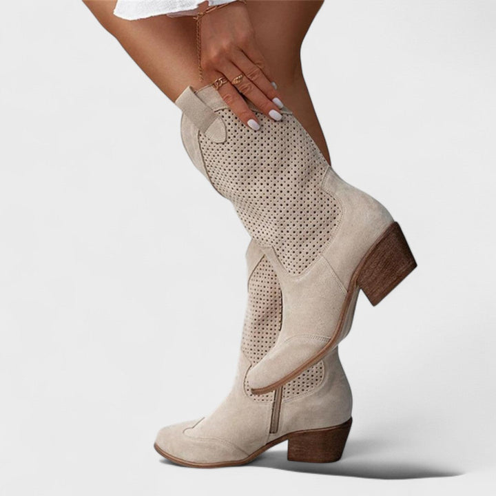 Versatile women's western boots for chic style, ideal for autumn and spring fashion footwear.