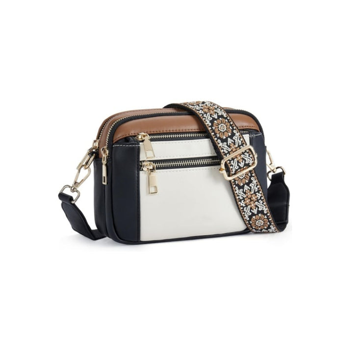 Organized women's crossbody bag, a lightweight accessory with an adjustable strap.