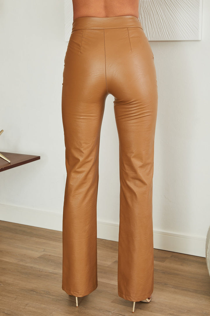 Faux leather straight leg trousers for women, showcasing a refined style.