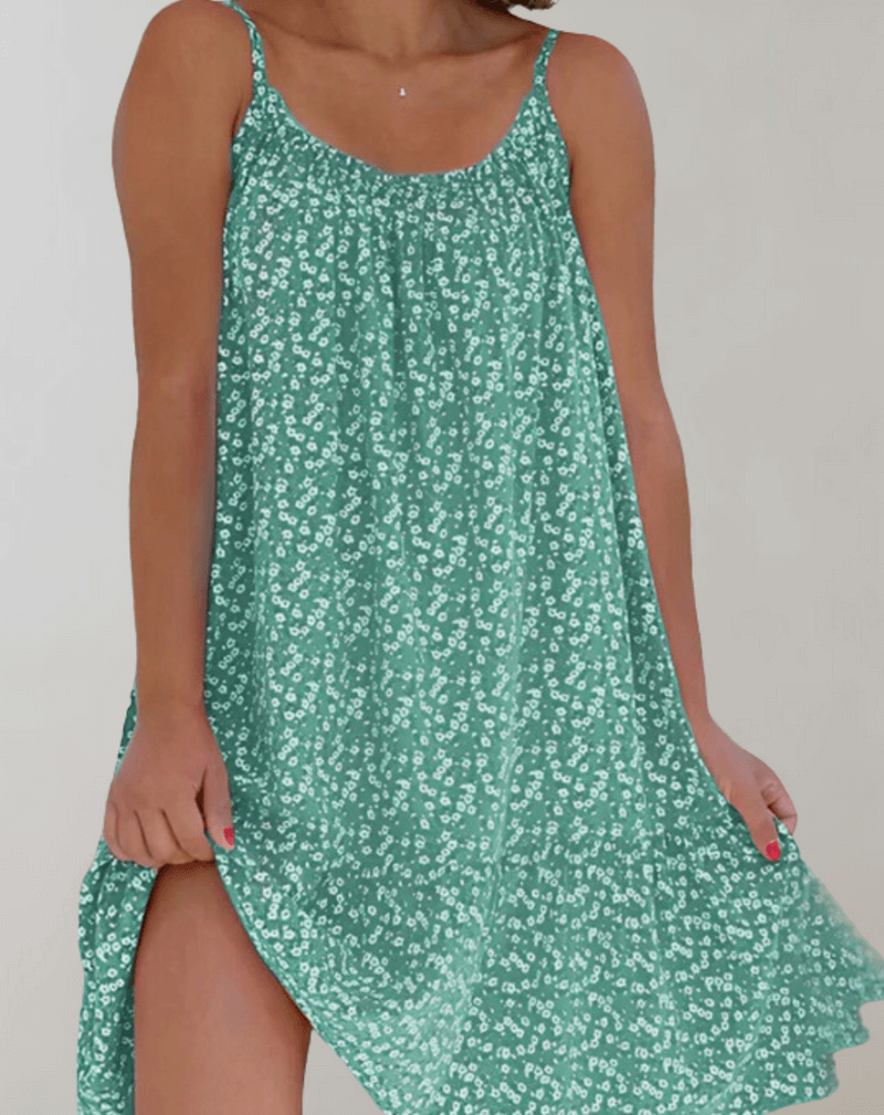 Elegant women's sleeveless floral midi dress, ideal for summer parties, vacations, or a flowy casual look.