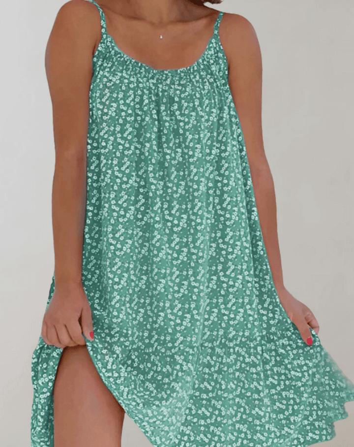 Elegant women's sleeveless floral midi dress, ideal for summer parties, vacations, or a flowy casual look.