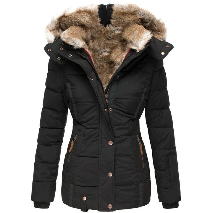 Close-up of the plush fur lining inside a women's cozy winter jacket.