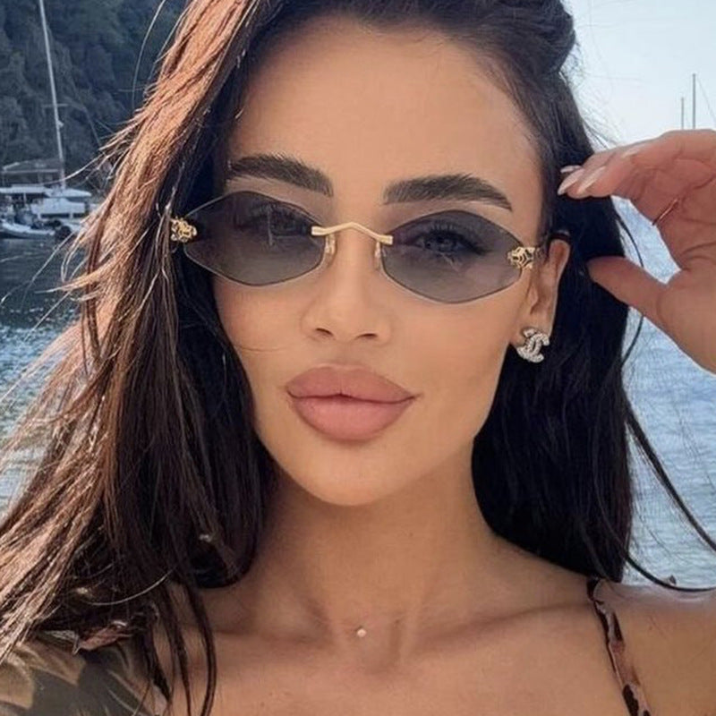 Modern geometric sunglasses for women, offering full UV protection. Features a unique double frame design.