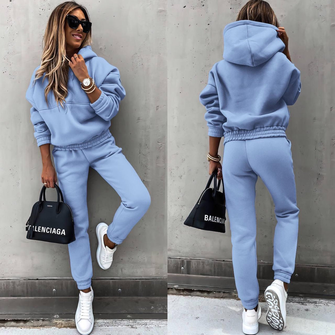 Versatile women's grey loungewear, a stylish sweatshirt and jogger matching set for comfortable everyday wear.