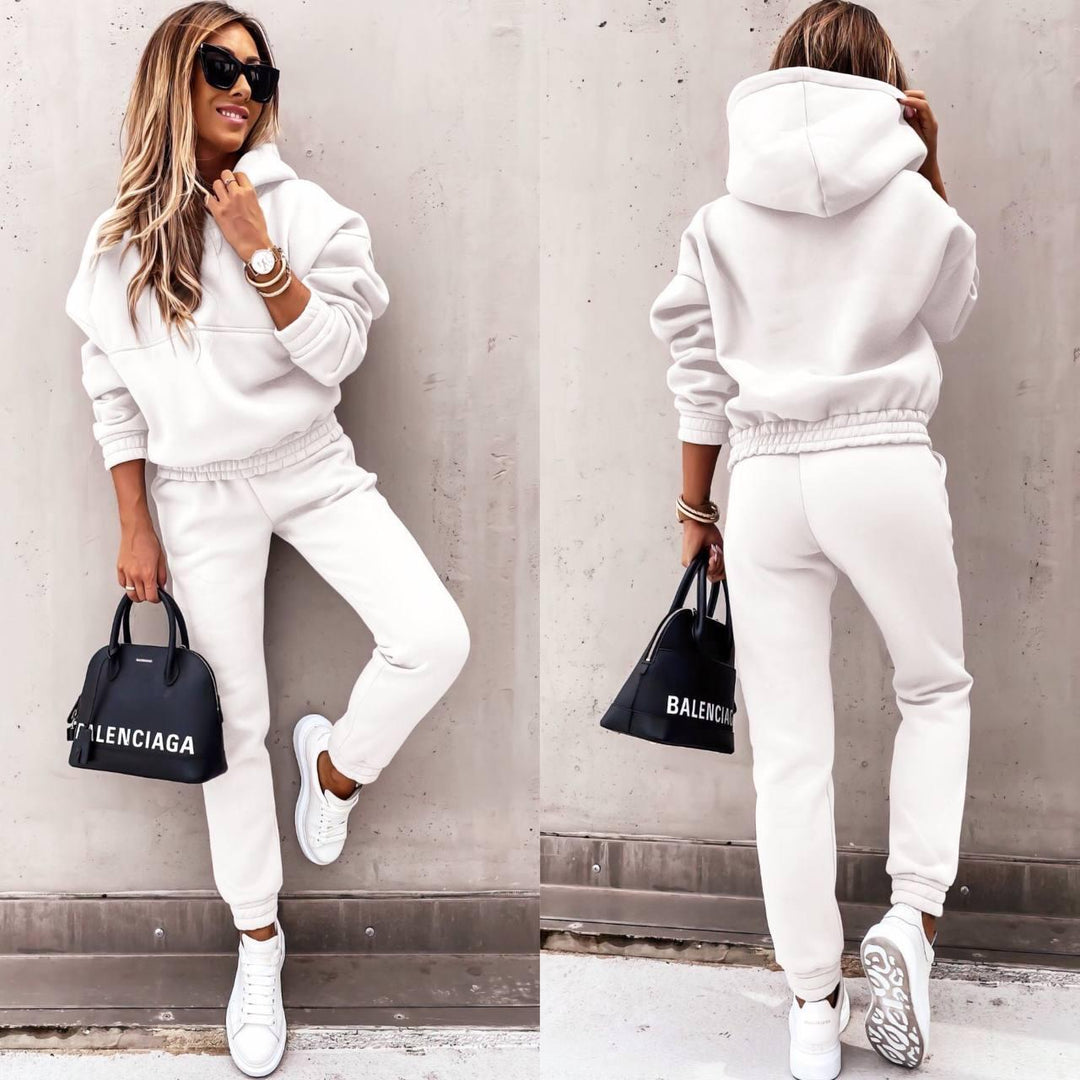 Grey casual set for women, a comfortable sweatshirt and jogger pants, perfect for relaxing or everyday errands.