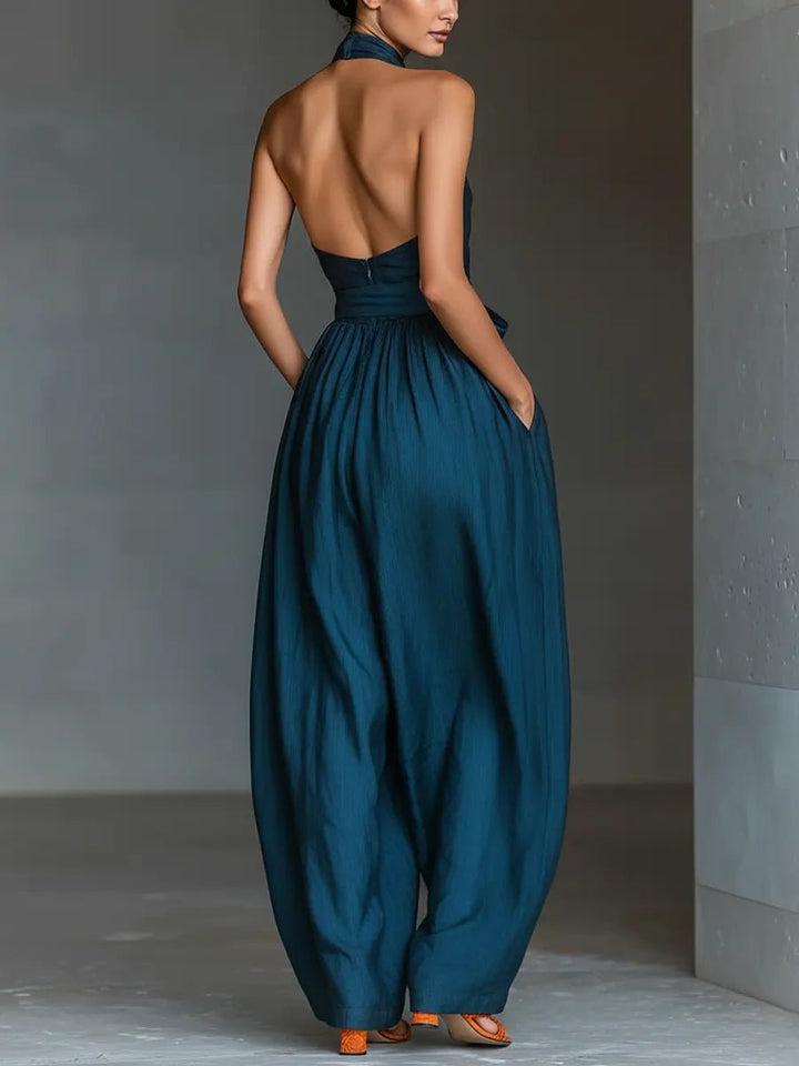 Chic women's wide-leg halter jumpsuit, offering elegant sleeveless design for versatile casual and summer wear.