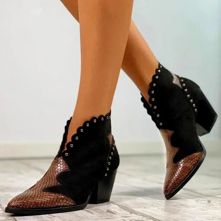 Fashionable women's lace-up cowboy ankle boots, pointed toe, for a chic western casual look. Comfortable footwear.