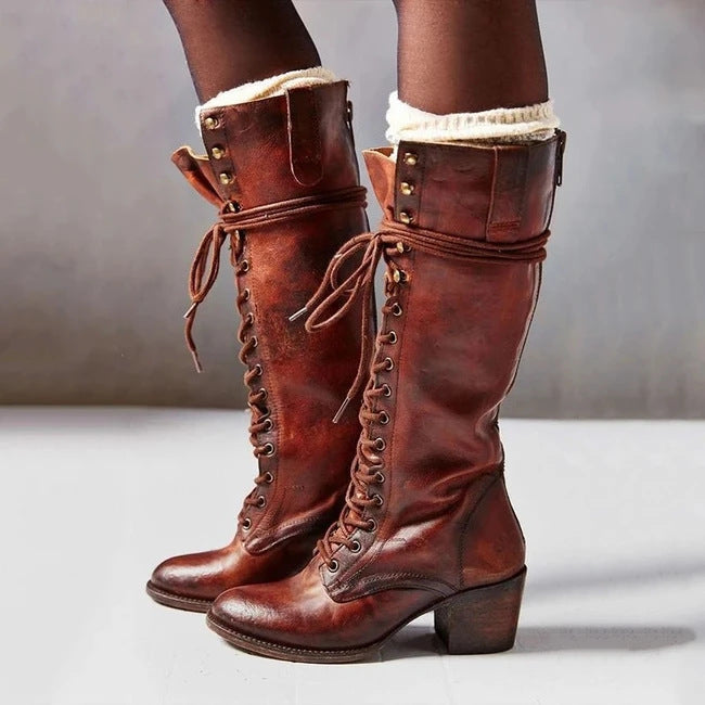 Women's chic lace-up knee boots, a stylish and elegant footwear choice for fashion-forward women.