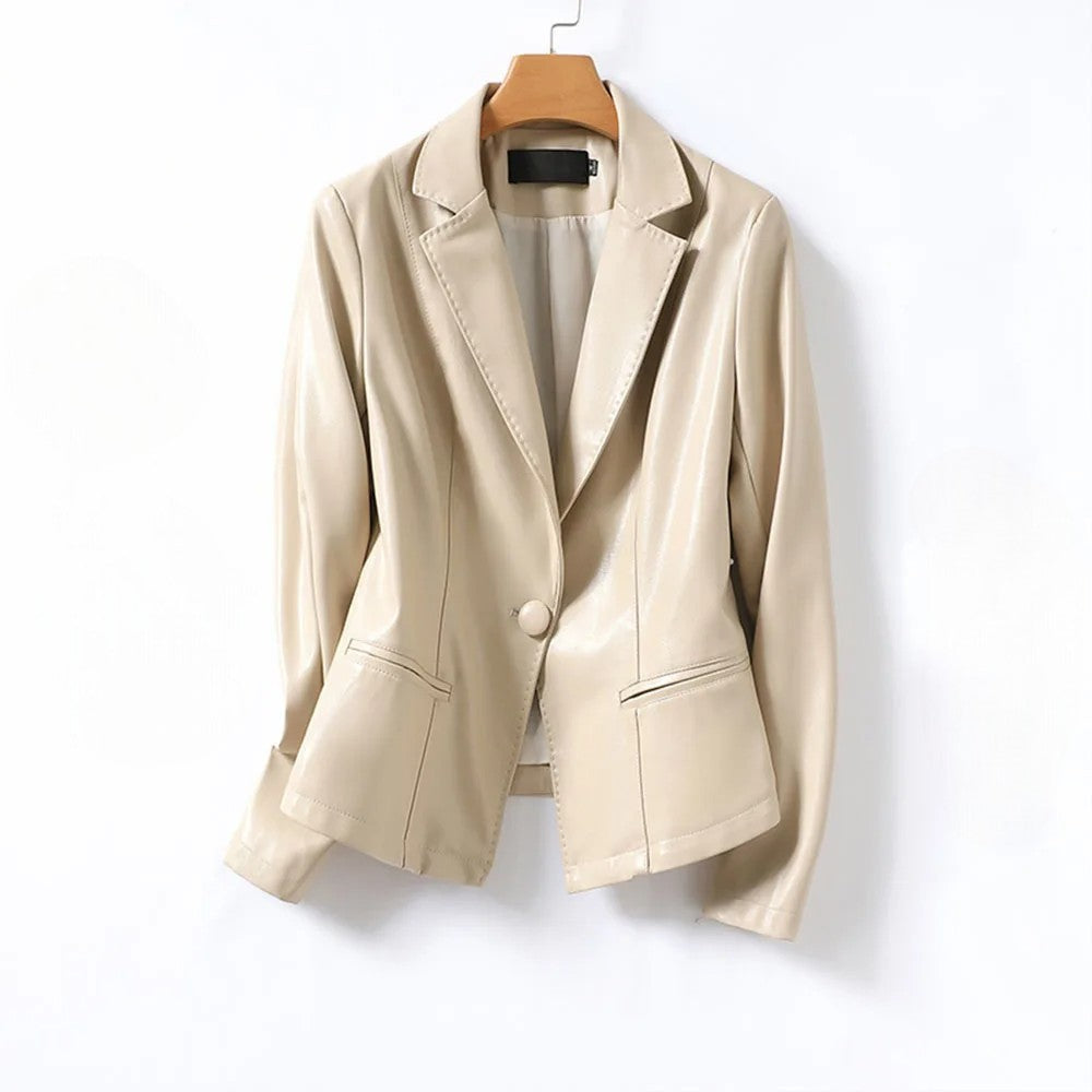 Stylish women's cream leather blazer with a modern one-button design, ideal for chic ensembles.