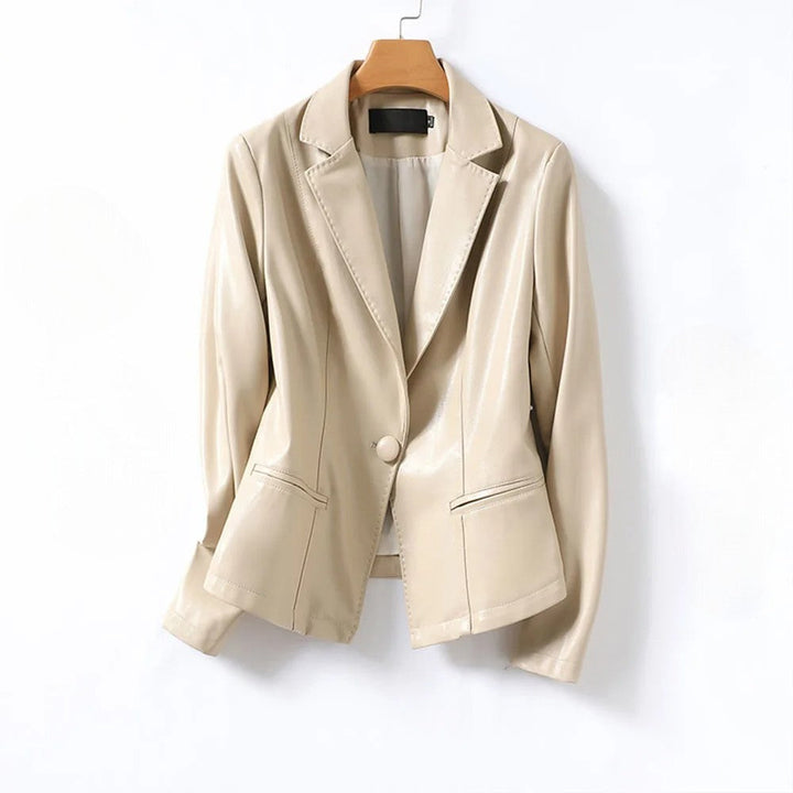 Stylish women's cream leather blazer with a modern one-button design, ideal for chic ensembles.