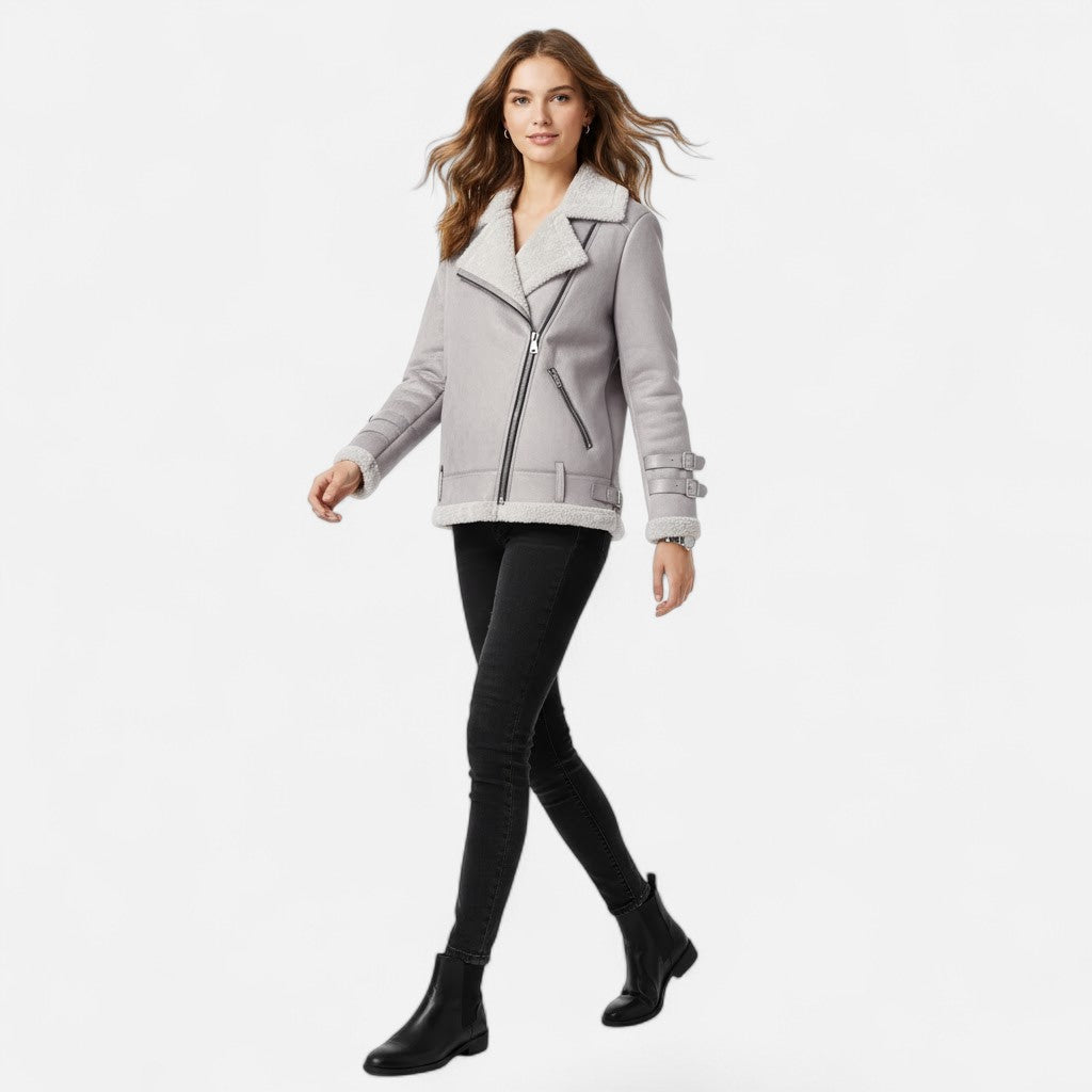 Women's chic moto winter coat, demonstrating its luxurious warmth and elegant style for cold weather fashion.
