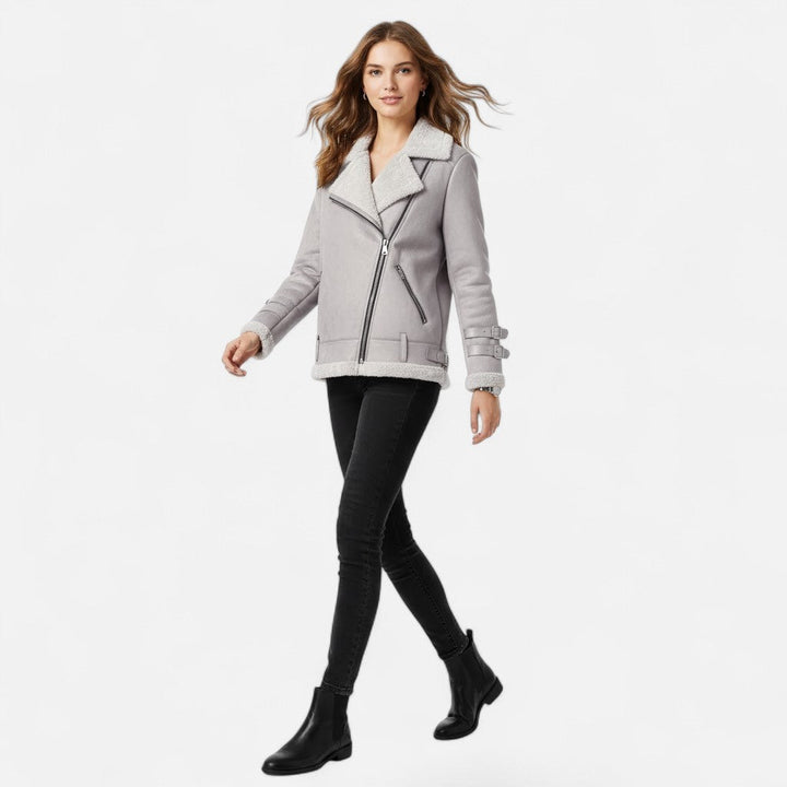 Women's chic moto winter coat, demonstrating its luxurious warmth and elegant style for cold weather fashion.