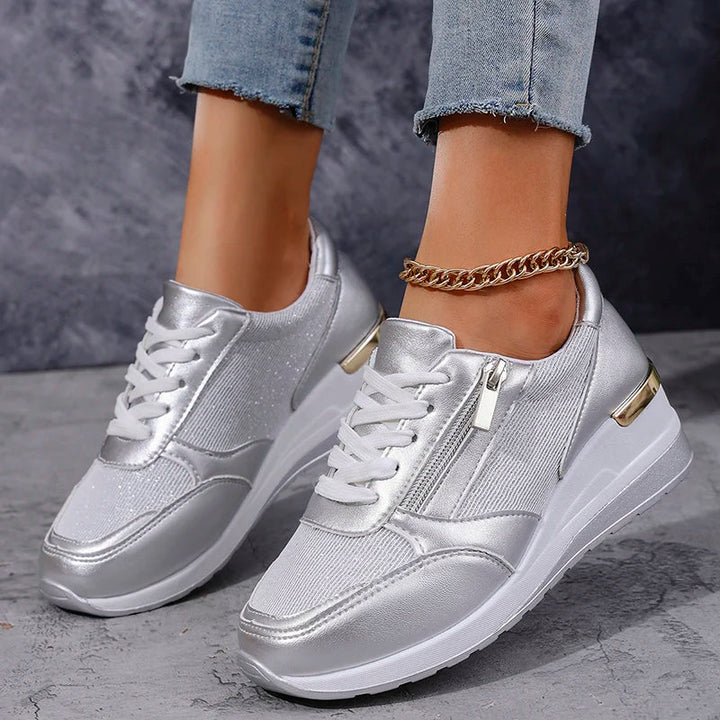 Top down view of chic women's platform trainers, lace-up orthopaedic sneakers for maximum comfort.