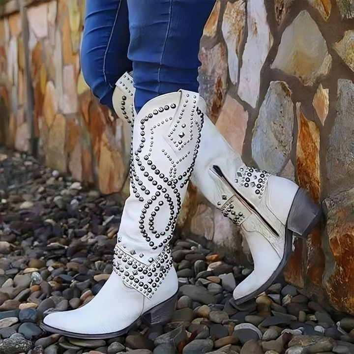 Orthopedic women's winter knee boots, blending comfort and style with a fashionable pointed toe and stable block heel.