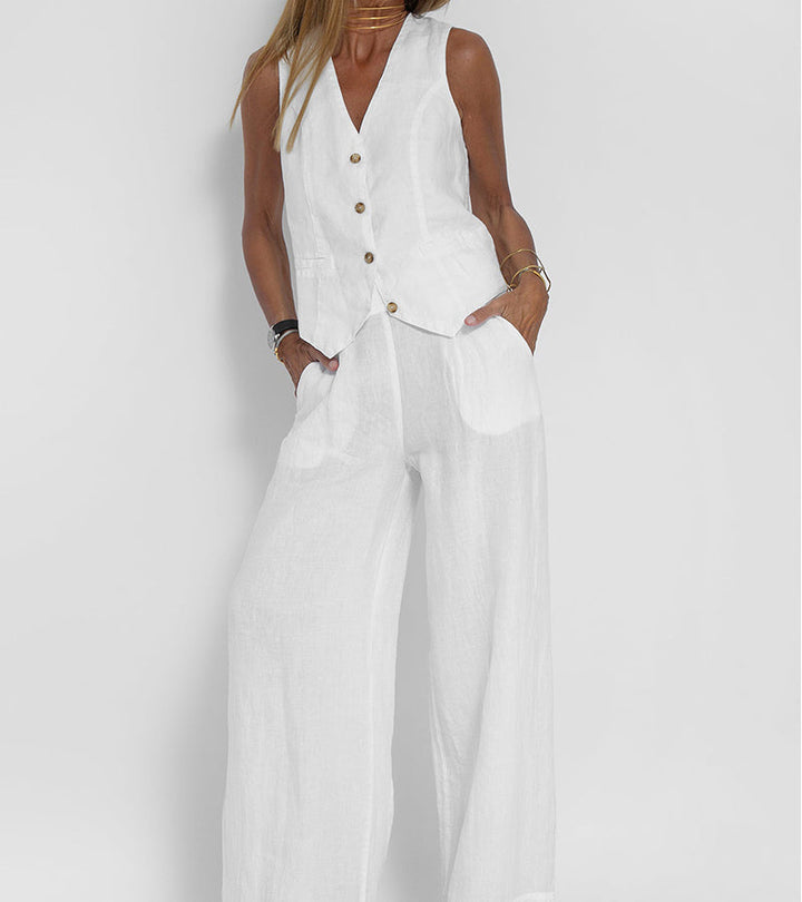 Side profile of a women's stylish sleeveless V-neck wide-leg trouser set.