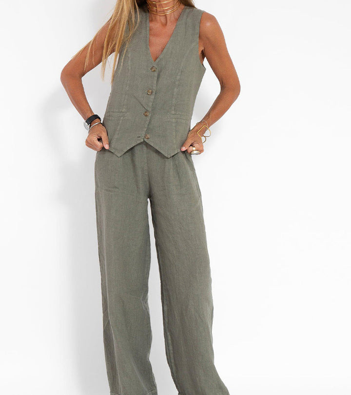 Women's elegant sleeveless V-neck wide-leg trouser set, styled for a chic look.