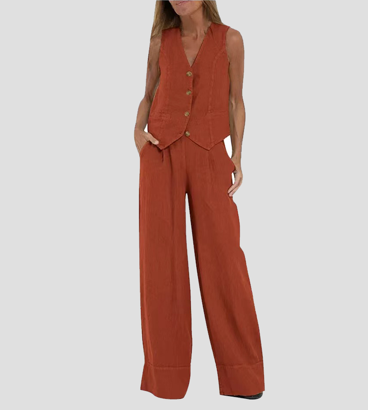 A complete women's sleeveless V-neck wide-leg trouser set, perfect for an elegant fashion statement.