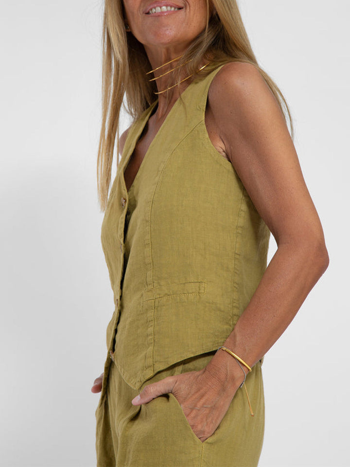 Stylish women's wide-leg trouser set, paired with a chic sleeveless V-neck top.