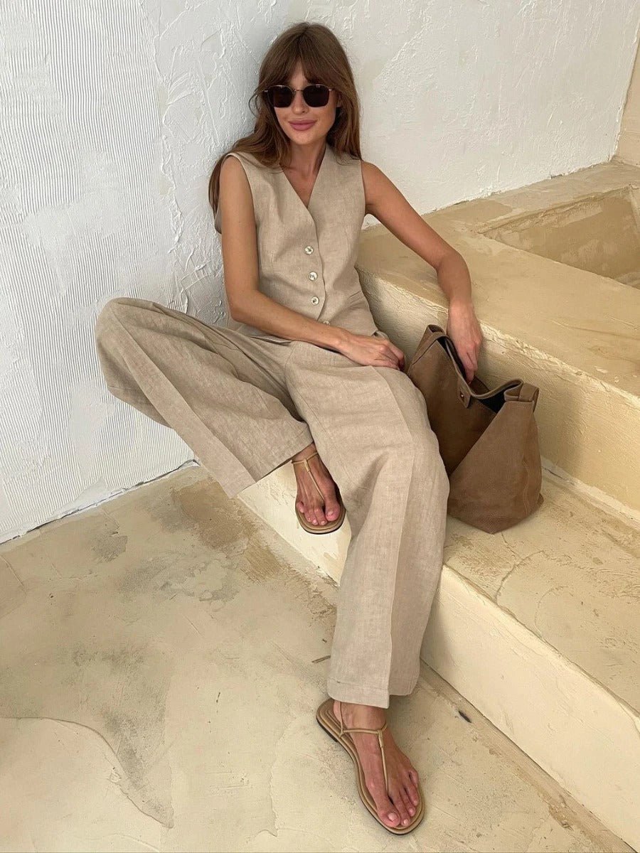 Coordinated two-piece set: sleeveless women's vest and wide-leg trousers for a stylish, modern look.