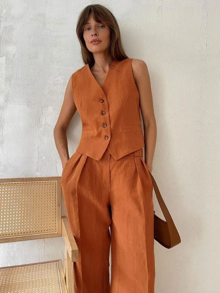 Sophisticated women's matching set: sleeveless top and wide-leg pants, versatile for casual or dressy occasions.