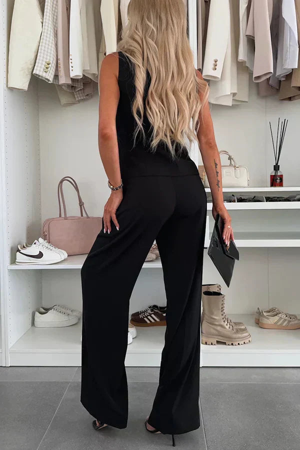 Complete women's matching outfit: chic sleeveless vest & flattering straight-leg trousers for a polished look.
