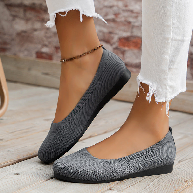 A pair of women's lightweight athletic sneakers designed for maximum comfort