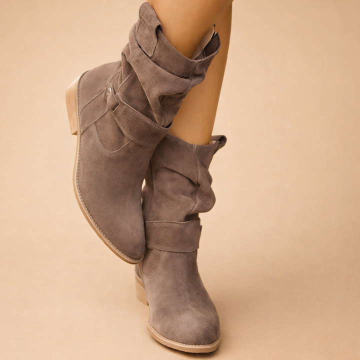 Comfortable women's slouch buckle ankle boots. Versatile winter footwear for an elegant or casual look.