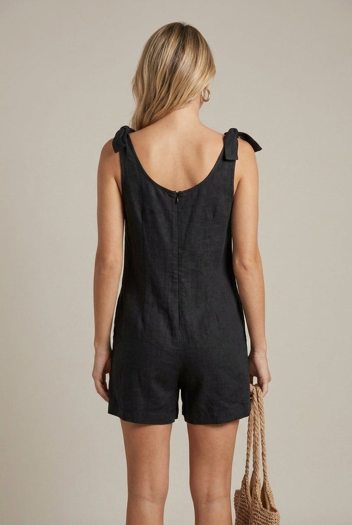 Adjustable bow strap romper with a flattering square neckline & practical pockets for women.