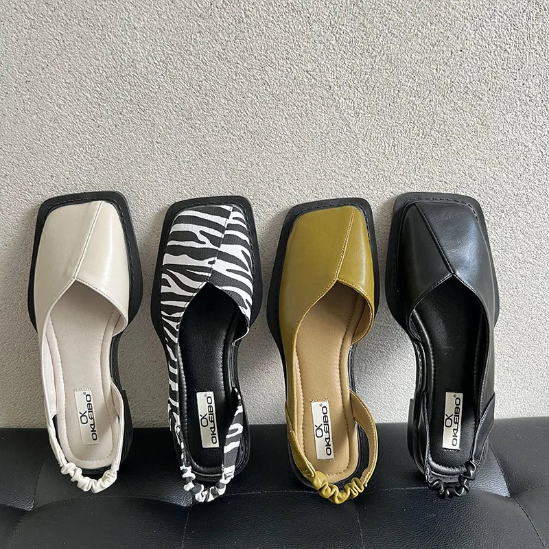 Close-up of women's comfortable slingback sandals with a modern square toe design