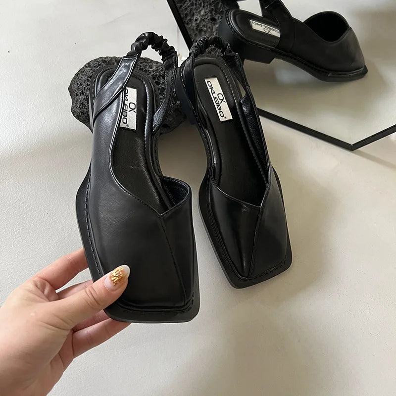 Side view of women's modern square toe slingback sandals, highlighting the design