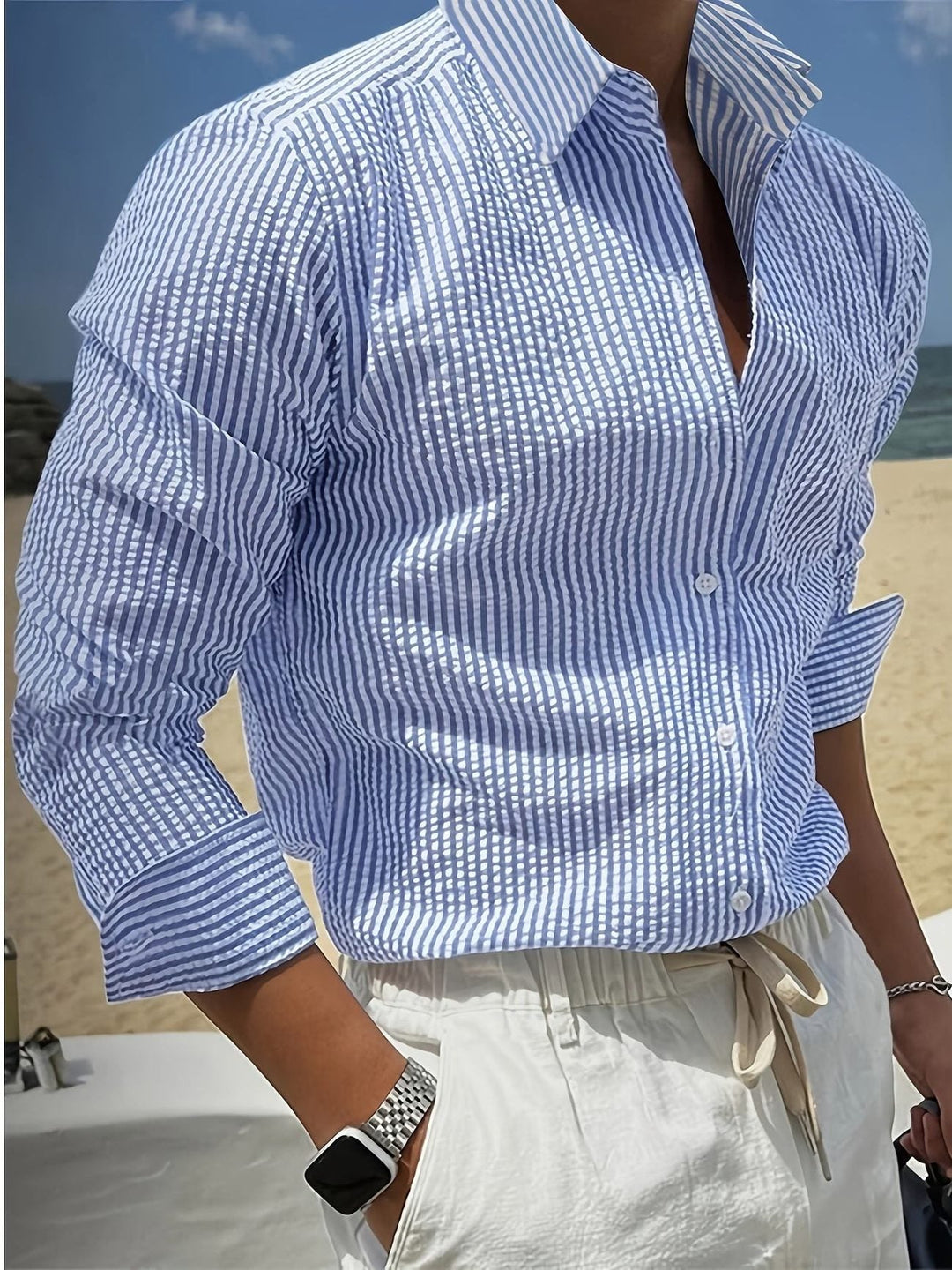 Modern women's striped long sleeve lapel shirt. Chic and versatile fashion top for a smart casual look.