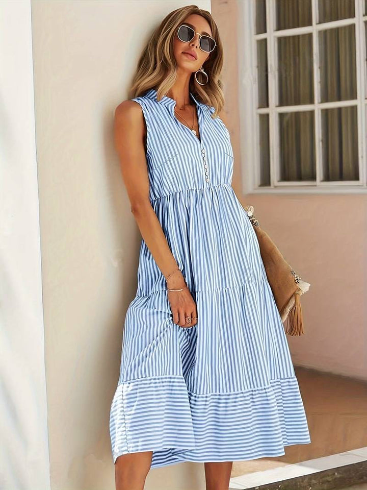 Striped sleeveless midi dress for women, featuring a tiered skirt, ideal for summer vacations & beach wear.