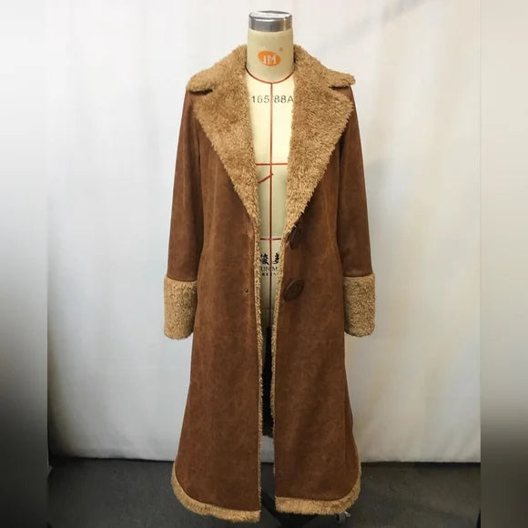 Timeless style women's outerwear: fashionable suede trench jacket with belt.