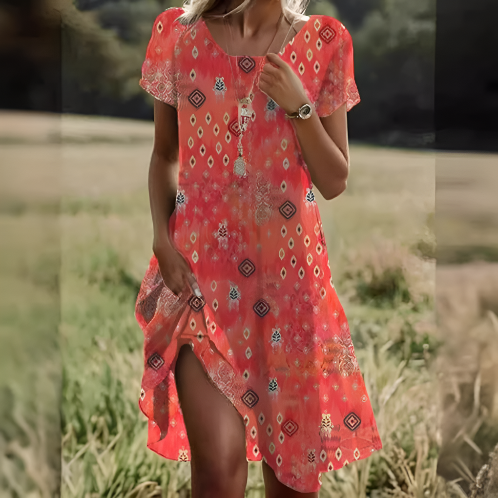 Close-up of the soft fabric of a chic women's flowy midi dress, highlighting comfort and style.
