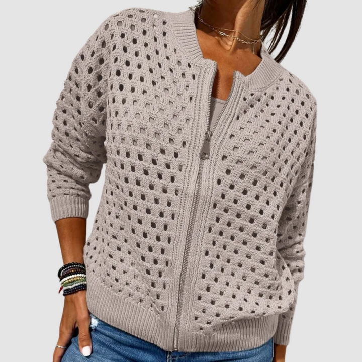 Chic women's versatile textured zipper cardigan for fashion layering and comfort.