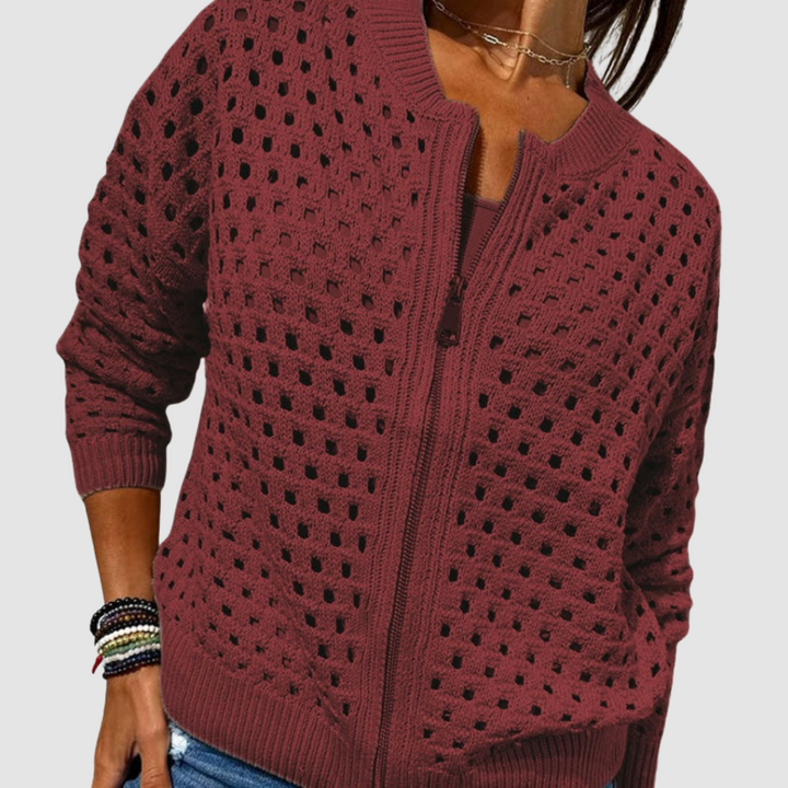 Comfortable women's chic textured zipper cardigan with a stylish hollow design detail.