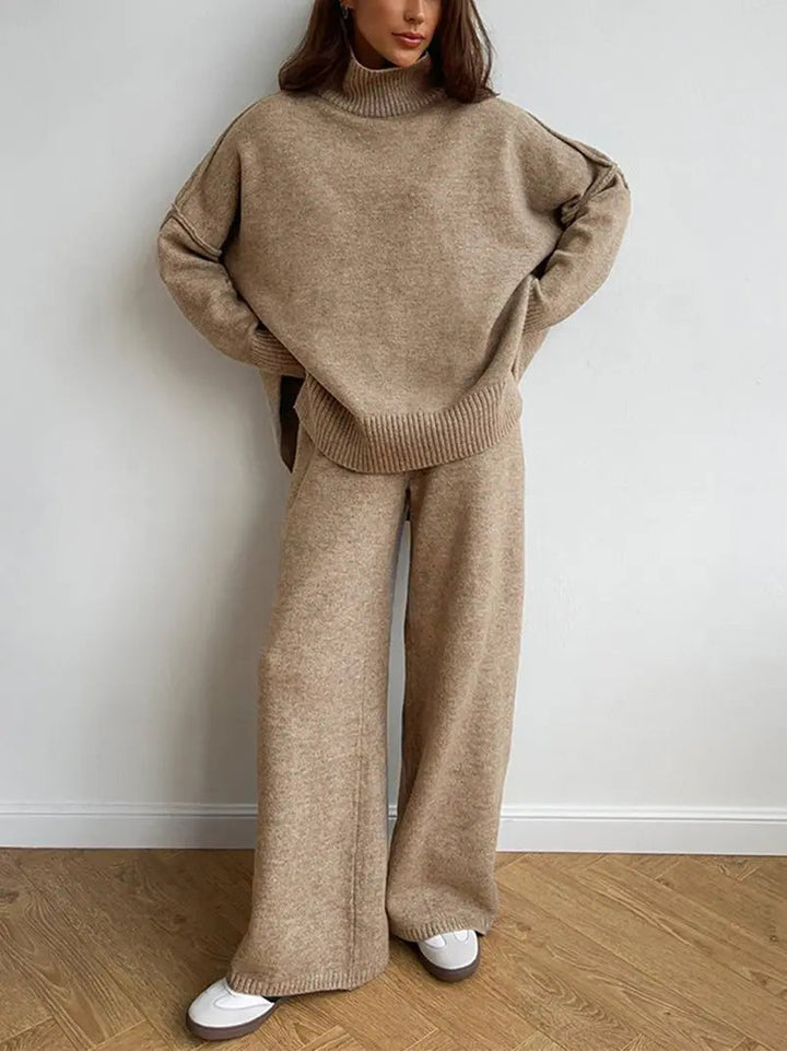 Relaxed fit women's turtleneck sweater and matching wide-leg trousers, perfect for chic loungewear.