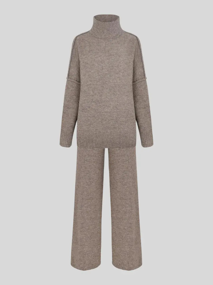 Minimalist style women's lounge set: oversized turtleneck and wide-leg trousers for effortless chic.
