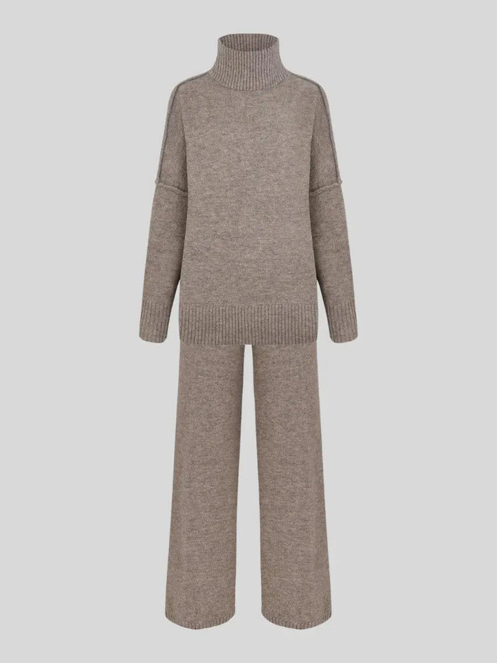 Minimalist style women's lounge set: oversized turtleneck and wide-leg trousers for effortless chic.