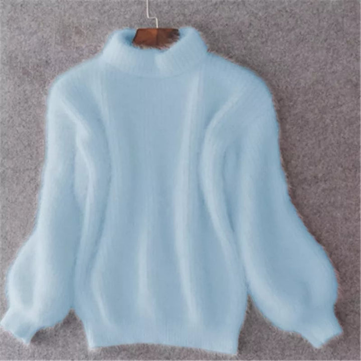 Women's chic turtleneck sweater in a solid color, perfect for cozy winter fashion & relaxed fall style.