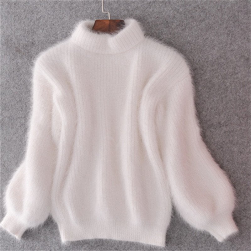 Elegant women's long sleeve turtleneck sweater, comfortable & a versatile layering piece for winter knitwear.
