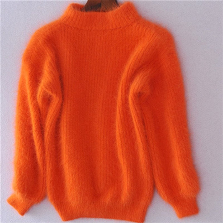 Cozy knit women's turtleneck sweater with a relaxed fit, ideal for chic fall and winter fashion.