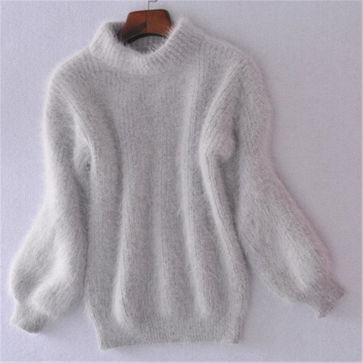 Stylish women's turtleneck sweater, a chic layering piece for cozy winter fashion and fall elegance.