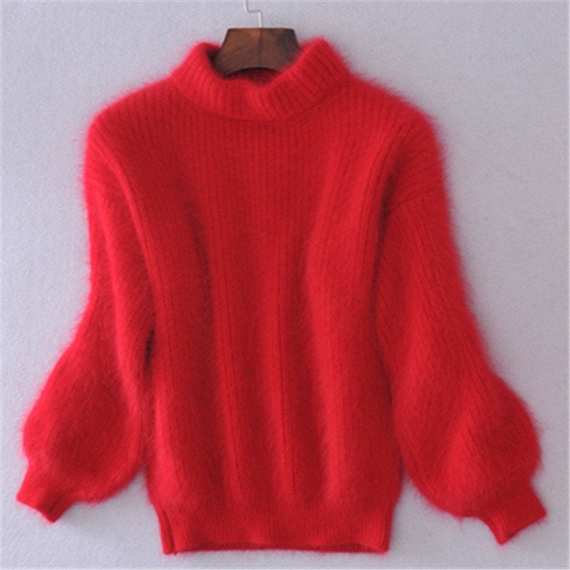 Relaxed fit women's turtleneck sweater, a comfortable and warm long sleeve knit for winter wear.